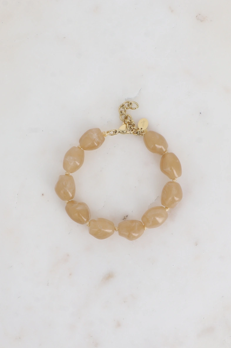 Bracelet en résine sixtine sur cordon beige