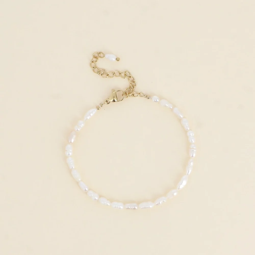 bracelet-sur-cordon-perles-d-eau-douce-allongees_blanc_66f0c5757e045